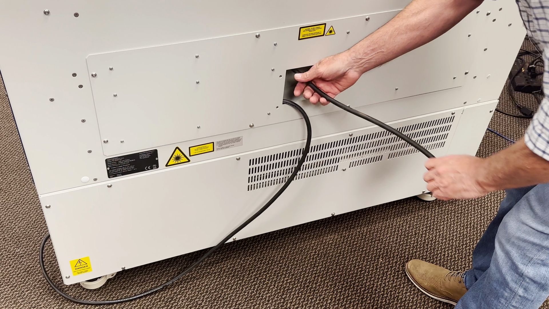 Removing power cord from machine