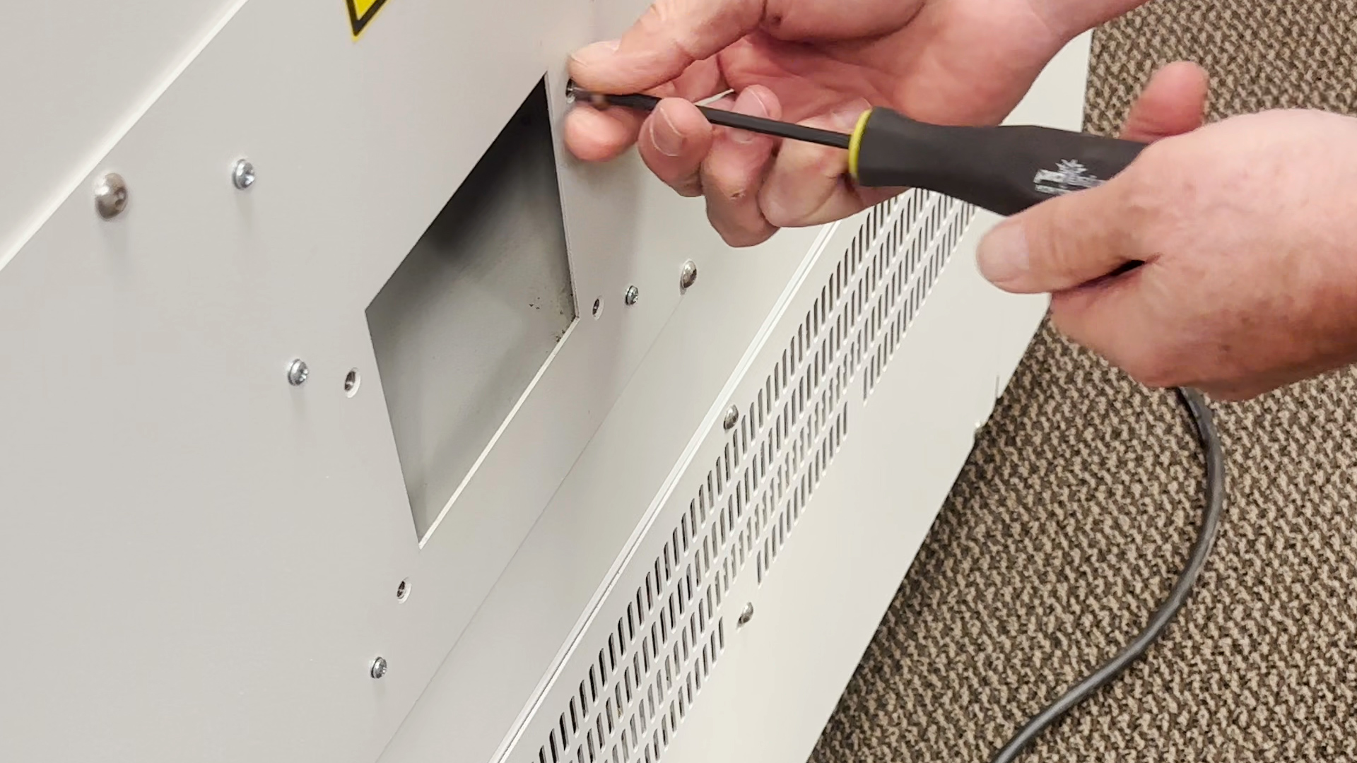 Removing hex screws from machine