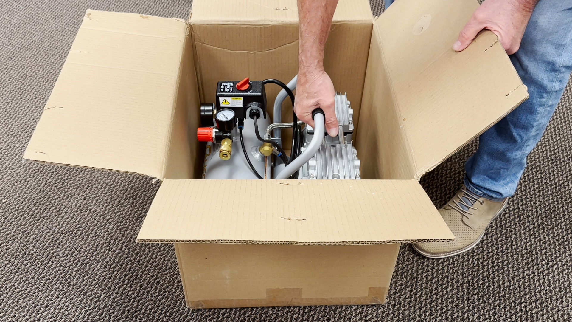 Removing air compressor from box