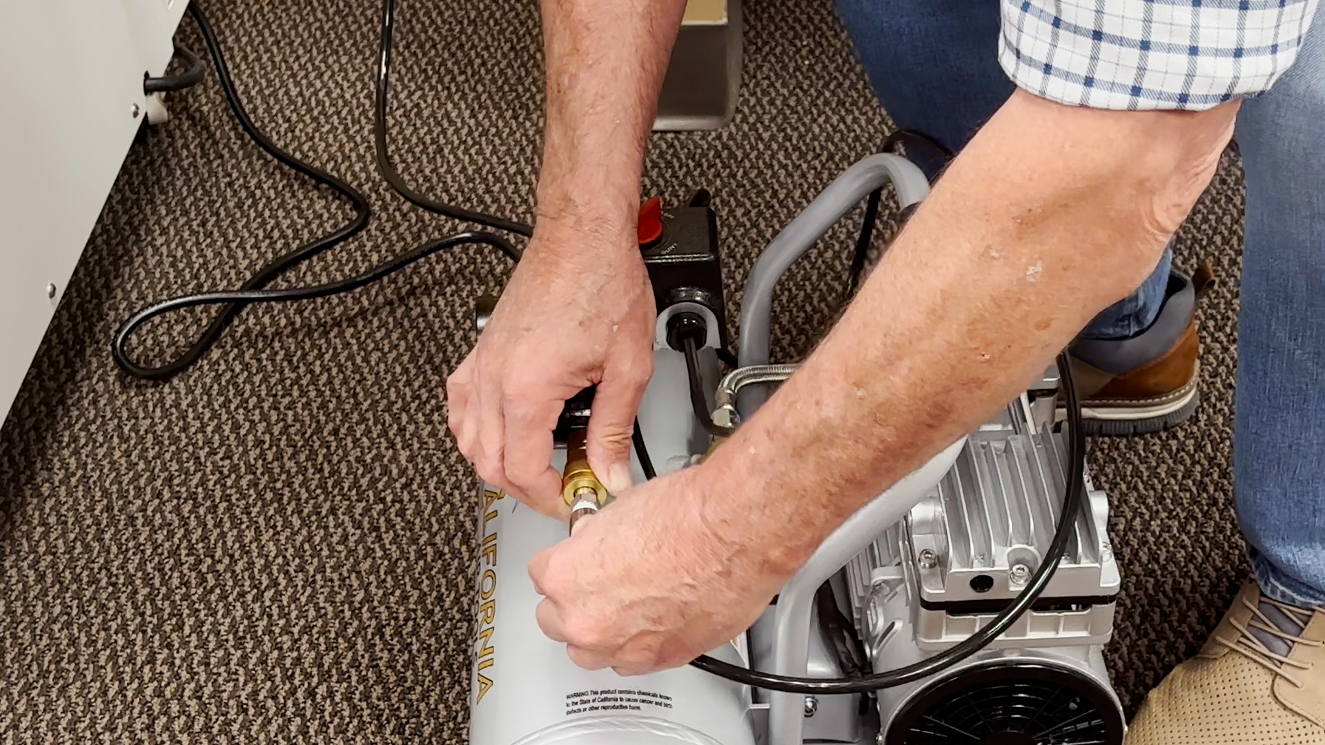 Attaching hose to the air compressor regulator to the air compressor