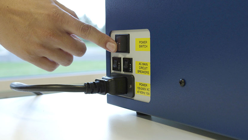 Shut off the laser and remove the power cord from the machine Flipping the machine's power switch