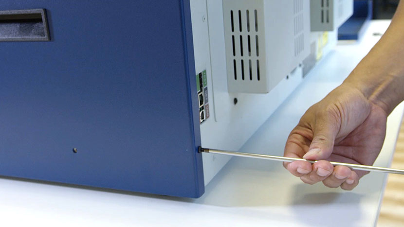 Remove the screws on the back of the right panel Removing the screws on the right panel's back face