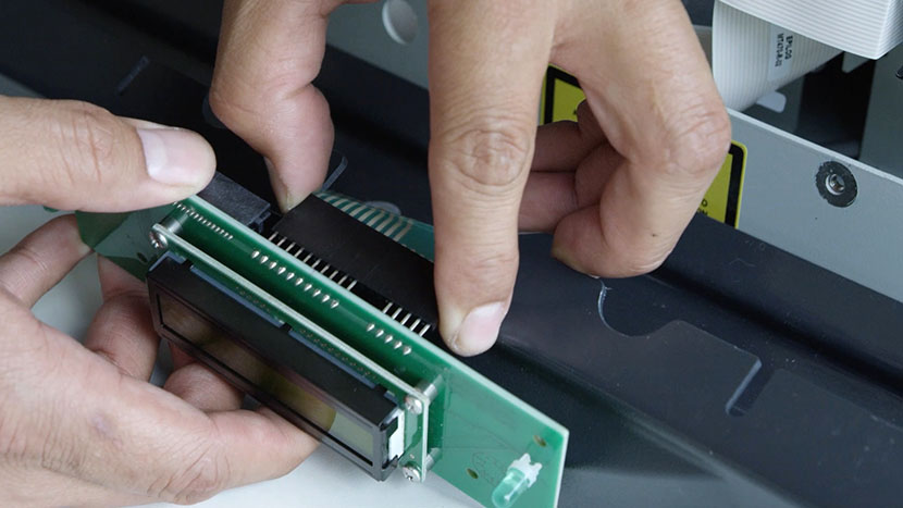 Unplug the control panel from the PCB Unplugging the control panel connector from the PCB