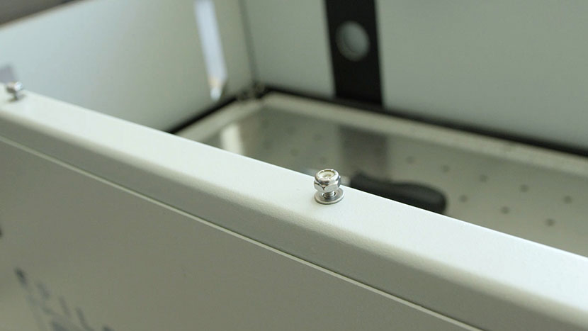 The loosened nuts the bezel will slide under The loosened nuts that will secure the bezel