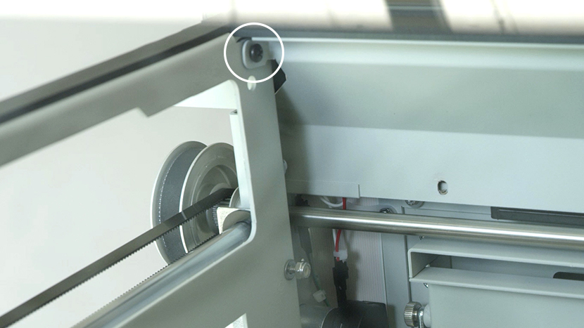 Install the top interior panel by loosely inserting the two top screws One of the top panel screws