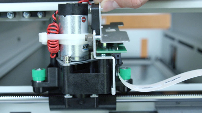 Remove the fan assembly. Lifting the fan assembly off the circuit board.