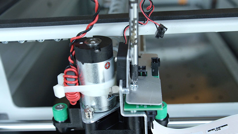 Reattach the fan assembly. Reattaching the fan assembly over the circuit board.