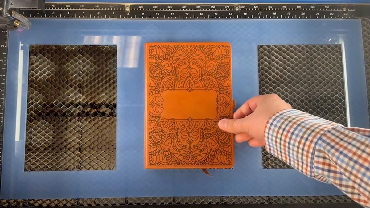 Load Jig and Pre-engraved Notebook load the jig when the time is right and add pre-engraved notebook