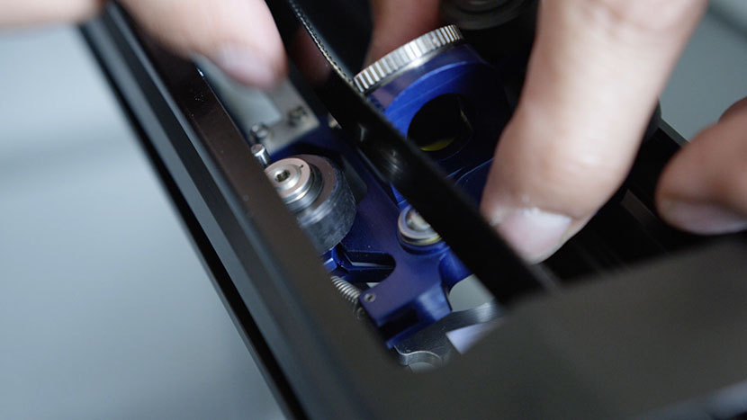 Reinstall the carriage. Putting the carriage back into the X-Axis Assembly.