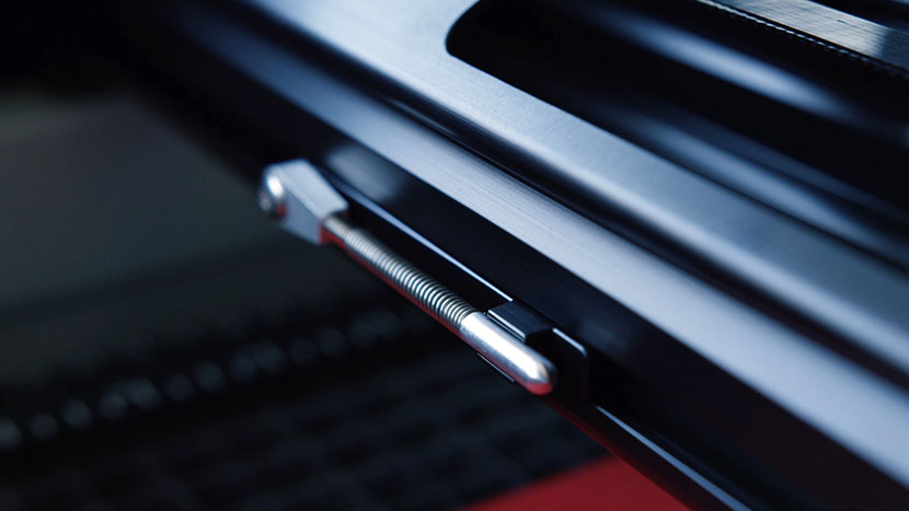 The manual focus gauge can be easily stowed on the X-Axis Assembly. The manual focus guage in the stowed position.