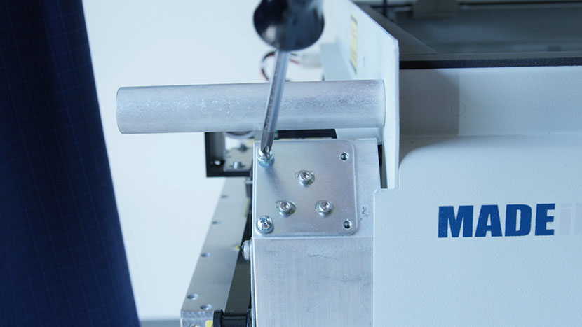 Reinsert the mirror at the top of the periscope housing. Reinserting the mirror at the top of the periscope.