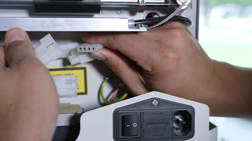 Disconnect the three power connections. Disconnecting the power supply cords.