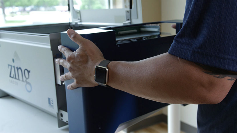 Put the right side panel back on the machine. Putting the right side panel back on the chassis.