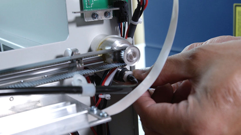 Remove the Air Assist tube. Unplugging the Air Assist tube.