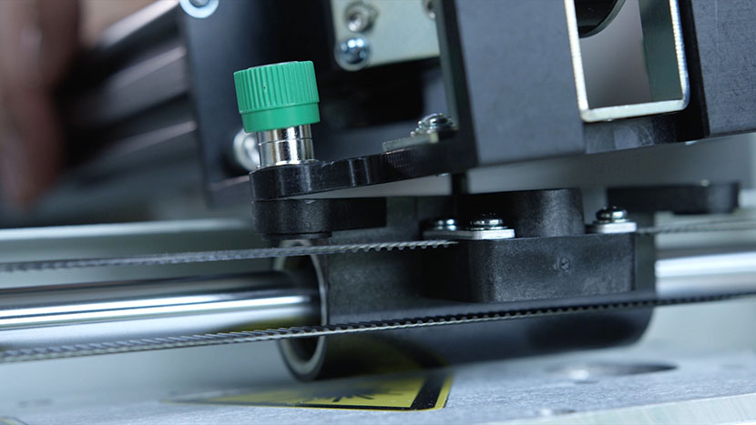 Align the green captive screws with the screw holes. Lining up the green captive screws with the mounting brackets.