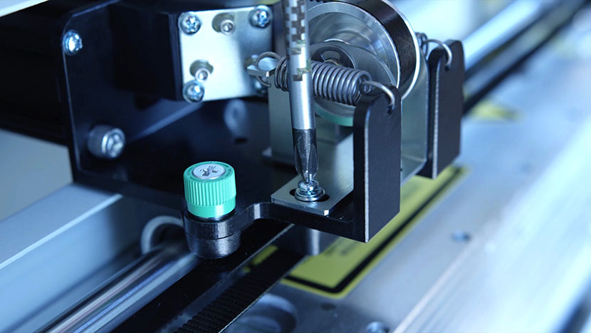 Loosen the Phillips screw on the back side of the metal plate. Loosening the screw on the front of the metal plate.