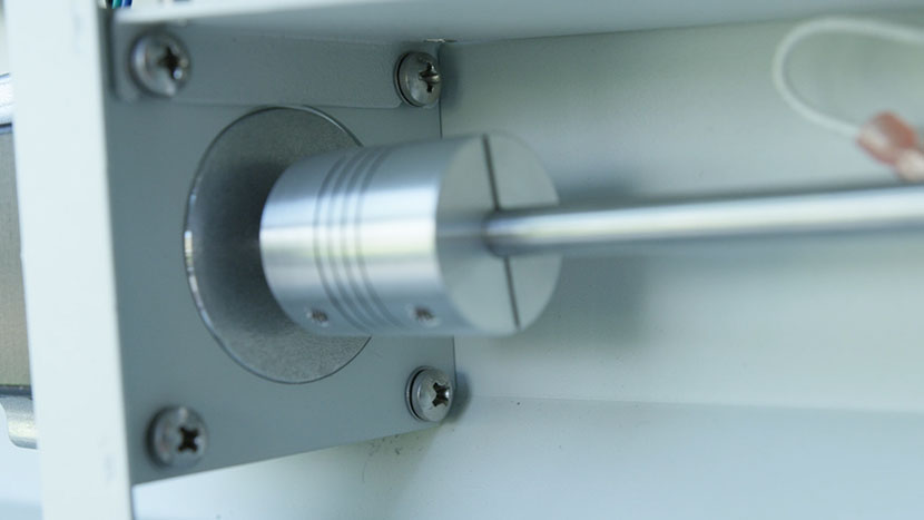 All four mounting screws installed. The Y-Motor installed with all four mounting screws.