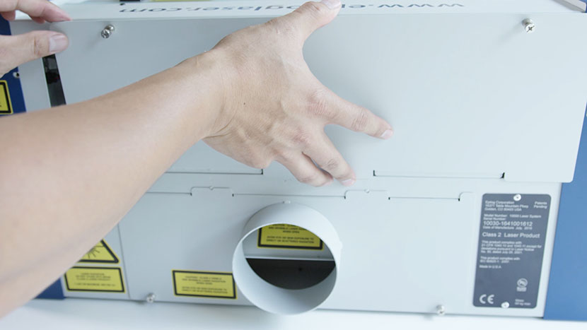 Slide the rear panel back into place. Installing the rear panel.